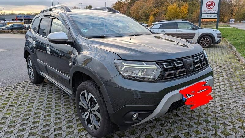 Grau Gebraucht 2021 Dacia Duster Prestige SUV | 10.900 € (Superpreis) - Bild 1/4