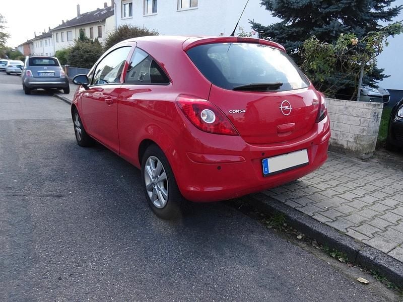 Używany Opel Corsa Edition 60 KM (44 kW) 2009 Czerwony Hatchback