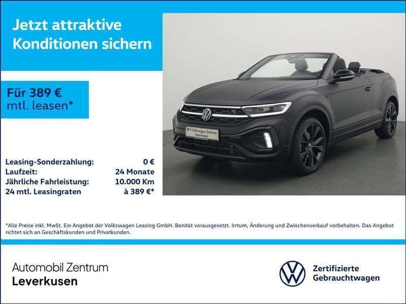 Schwarz / deep black (metallic) Gebraucht 2024 VW T-Roc Cabriolet R-line Cabrio | 41.480 € - Bild 1/3