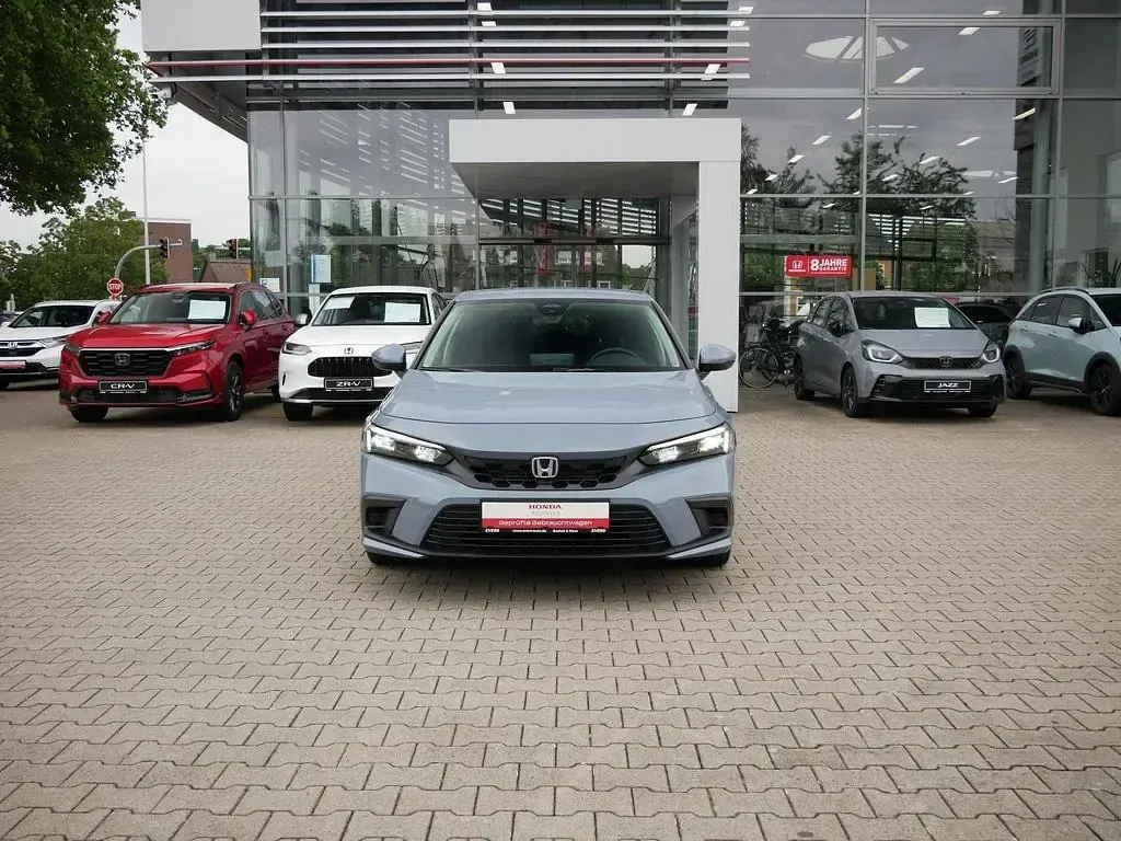 Gebraucht Honda Civic Elegance 184 PS (135 kW) 2024 Grau Limousine