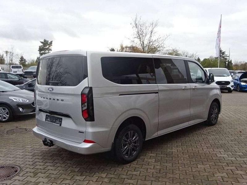Gebraucht Ford Tourneo Custom Titanium 170 PS (125 kW) 2024 Moondustsilver metallic Van
