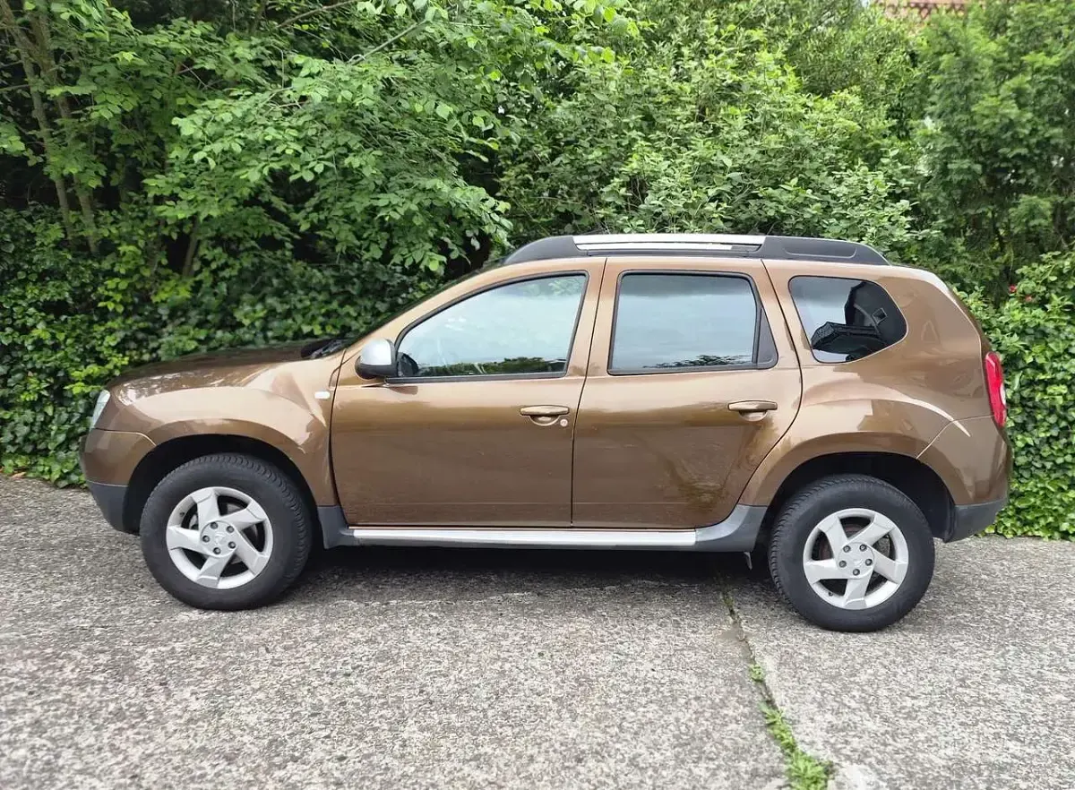Gebraucht Dacia Duster Lauréate 105 PS (77 kW) 2012 Braun SUV