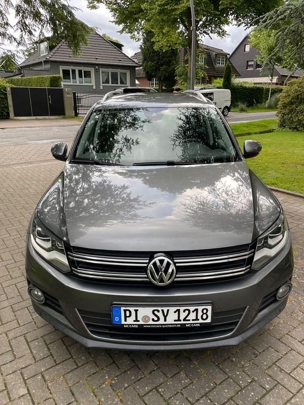 Grau Gebraucht 2014 VW Tiguan Sportline SUV | 13.500 € (Fairer Preis) - Bild 1/4