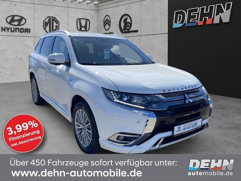 Weiß Gebraucht 2020 Mitsubishi Outlander P-HEV Plus SUV | 21.970 € (Fairer Preis) - Bild 1/4