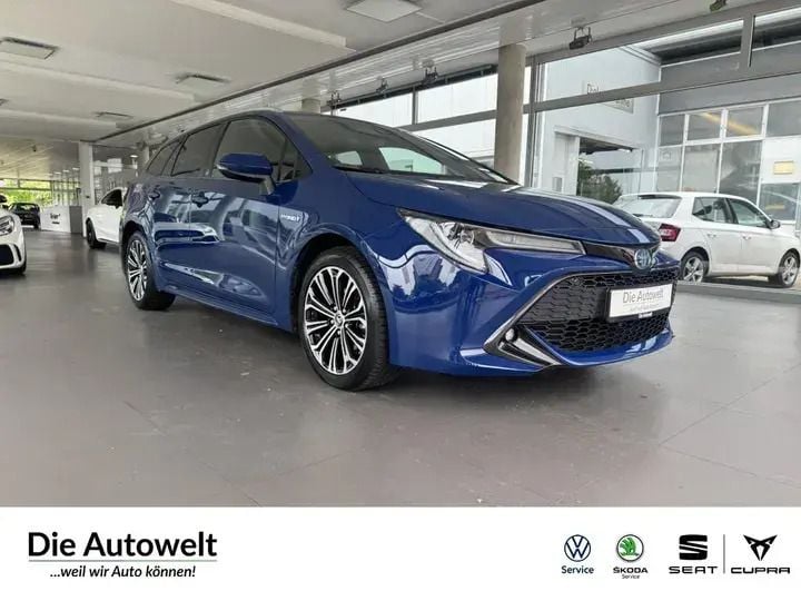 Black mica (schwarz) Gebraucht 2020 Toyota Corolla Hybrid Club | 18.780 € (Superpreis) - Bild 1/2
