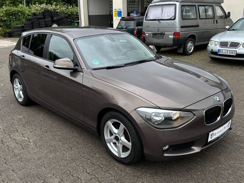 Braun Gebraucht 2013 BMW 116 Advantage Kleinwagen | 12.999 € (Etwas zu teuer) - Bild 1/4