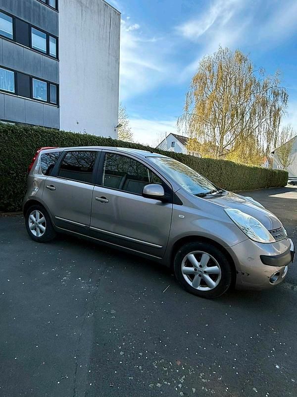 Second-hand Nissan Note 110 CP (80 kW) 2007 Auriu Hatchback