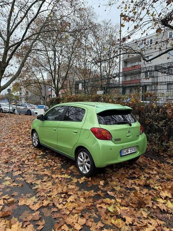 Gebraucht Mitsubishi Space Star 80 PS (58 kW) 2013 Grün Limousine