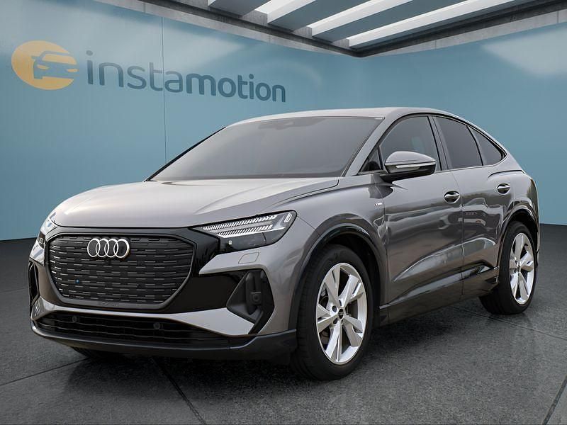 Grau Gebraucht 2022 Audi Q4 e-tron SUV | 31.949 € (Guter Preis) - Bild 1/4
