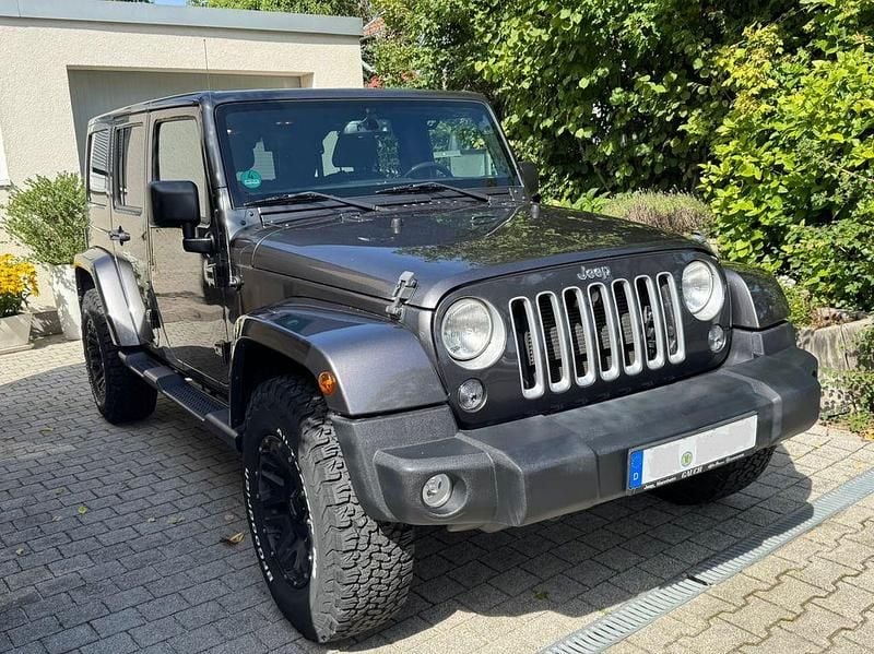 Grau Gebraucht 2018 Jeep Wrangler Sahara SUV | 44.100 € (Fairer Preis) - Bild 1/4