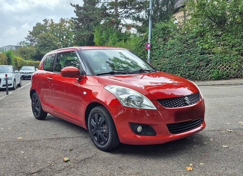 Orange Gebraucht 2011 Suzuki Swift Kleinwagen | 4.790 € (Fairer Preis) - Bild 1/4