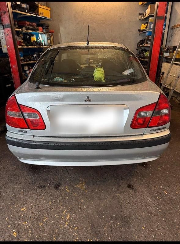 Gebraucht Mitsubishi Carisma 106 PS (77 kW) 2003 Grau Limousine