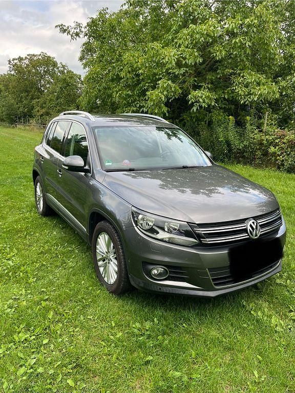 Grau Gebraucht 2014 VW Tiguan Sportline SUV | 11.000 € (Fairer Preis) - Bild 1/4
