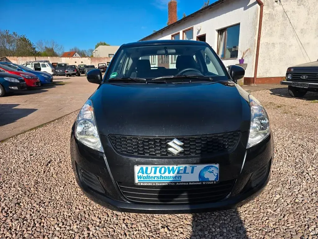 Second-hand Suzuki Swift 94 CP (69 kW) 2013 Negru Hatchback