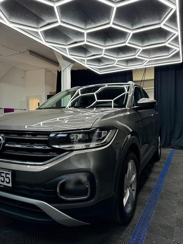 Grau Gebraucht 2021 VW T-Cross Style SUV | 21.850 € (Fairer Preis) - Bild 1/4