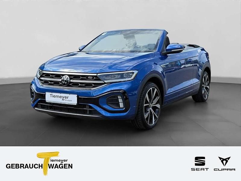 Ravennablau metallic Gebraucht 2024 VW T-Roc Cabriolet R-line Cabrio | 36.940 € (Etwas zu teuer) - Bild 1/4