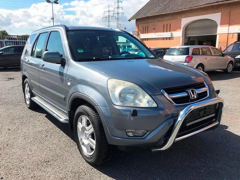 Grau Gebraucht 2004 Honda CR-V ES SUV | 4.499 € (Teuer) - Bild 1/4