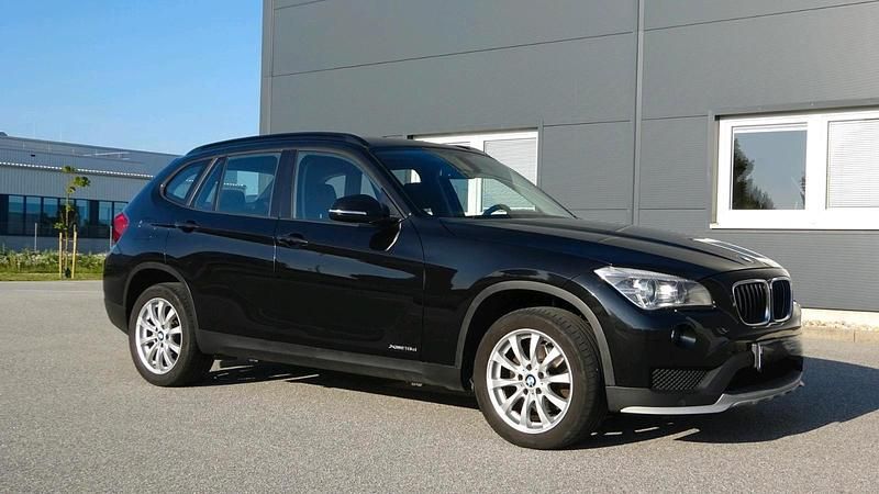 Second-hand BMW X1 143 CP (105 kW) 2014 Negru SUV