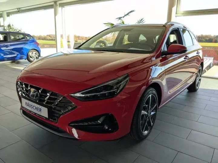 Rot schwarz Gebraucht 2023 Hyundai i30 Prime Kombi | 22.990 € (Fairer Preis) - Bild 1/4