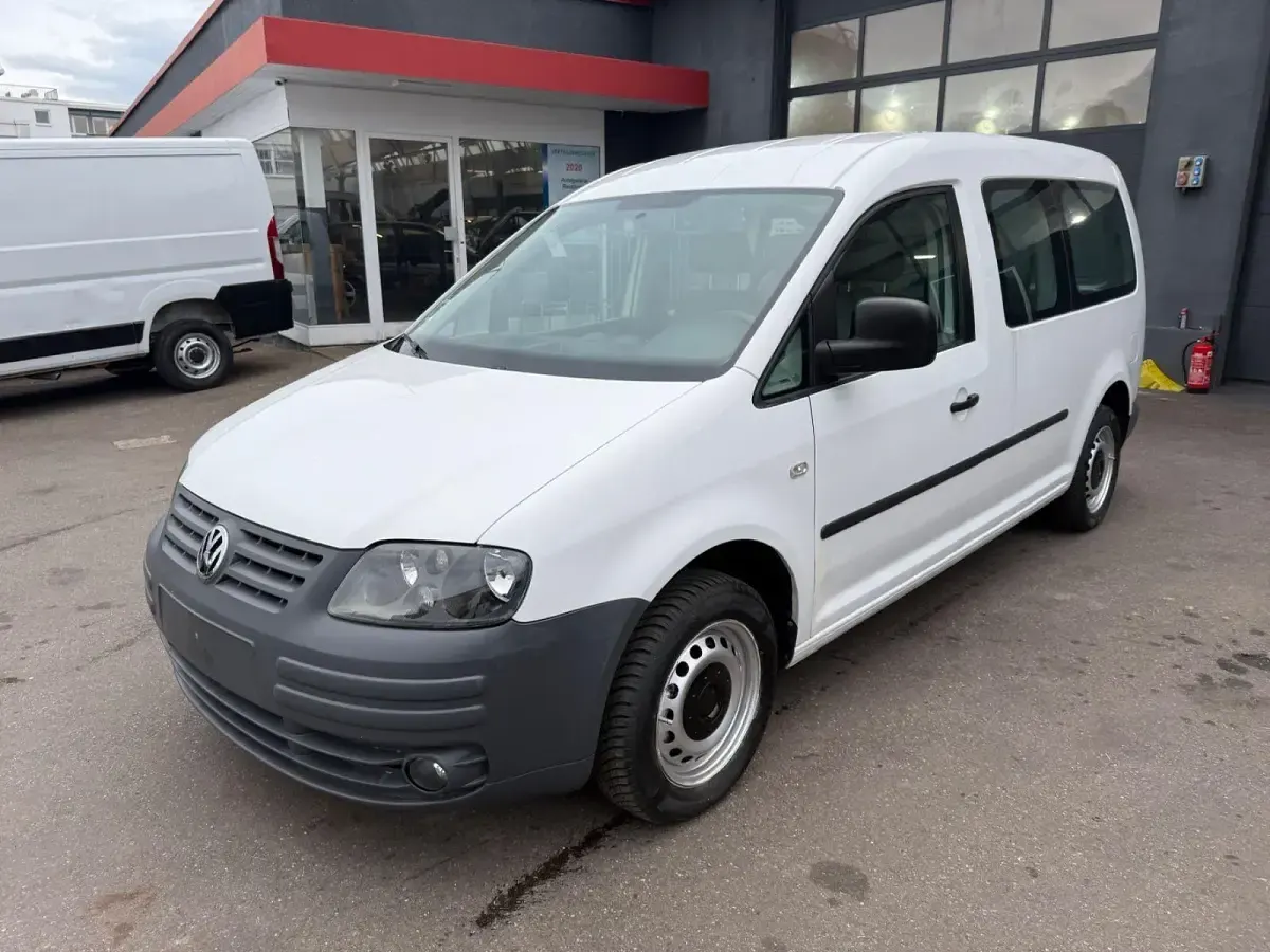 Second-hand VW Caddy Maxi 105 CP (77 kW) 2010 Alb Monovolum