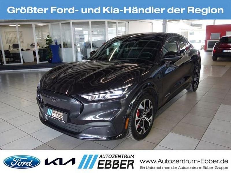 Grau Gebraucht 2024 Ford Mustang Mach-E Extended Range SUV | 41.878 € (Superpreis) - Bild 1/3