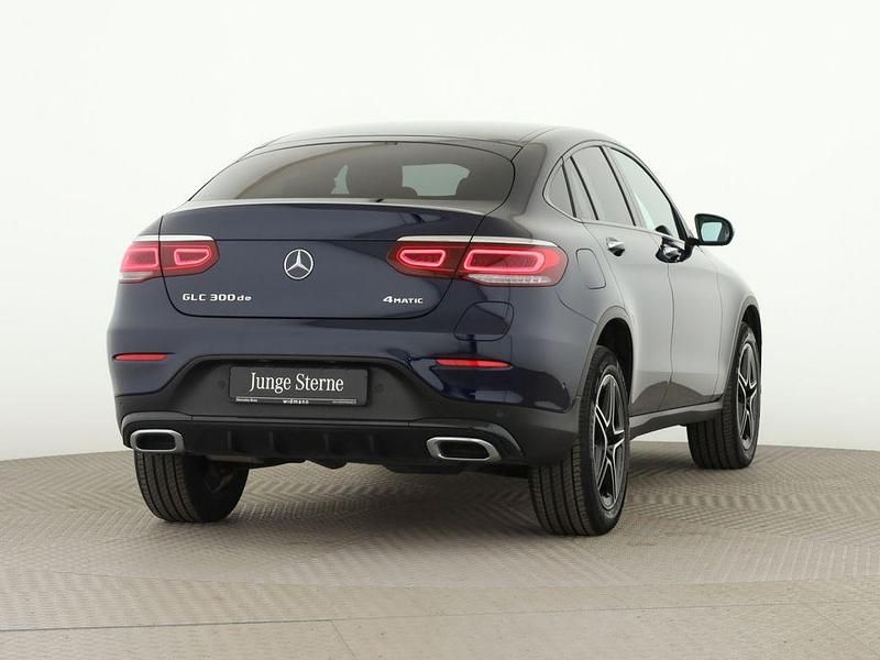 Gebraucht Mercedes GLC300e AMG 306 PS (225 kW) 2022 Cavansitblau metallic Coupé