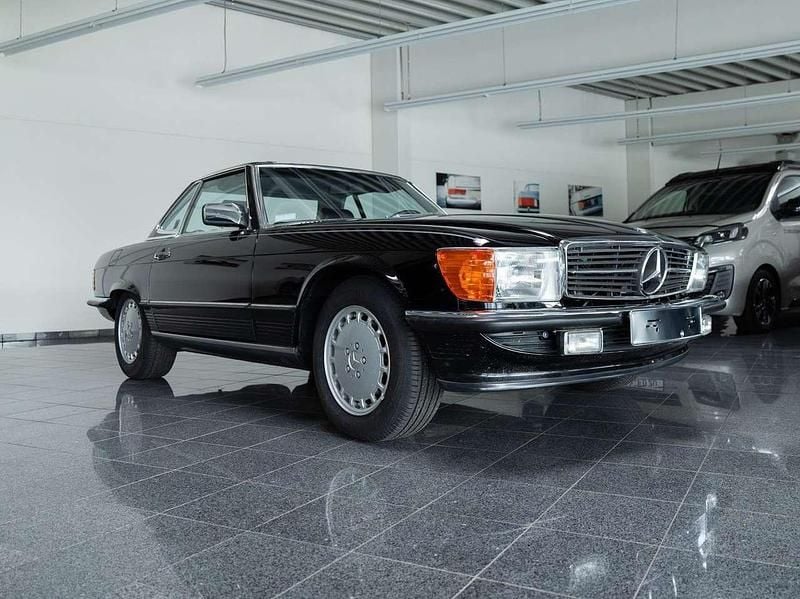 Blauschwarzmetallik Gebraucht 1988 Mercedes 560 Cabrio | 75.600 € - Bild 1/4