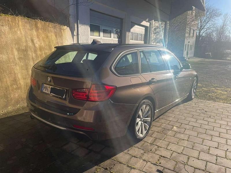 Gebraucht BMW 320 Sport Line 184 PS (135 kW) 2012 Braun Kombi