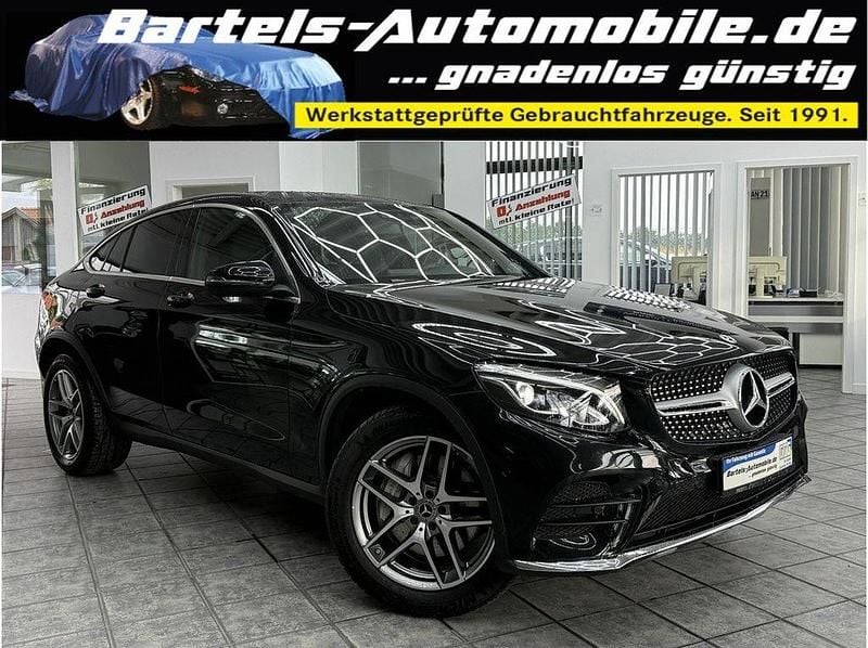 Obsidianschwarz metalliclack Gebraucht 2019 Mercedes GLC250 AMG line Coupé | 34.890 € (Fairer Preis) - Bild 1/4