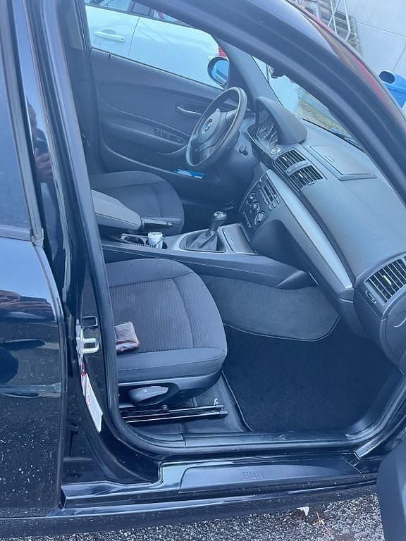 Gebraucht BMW 116 122 PS (89 kW) 2008 Schwarz Kleinwagen