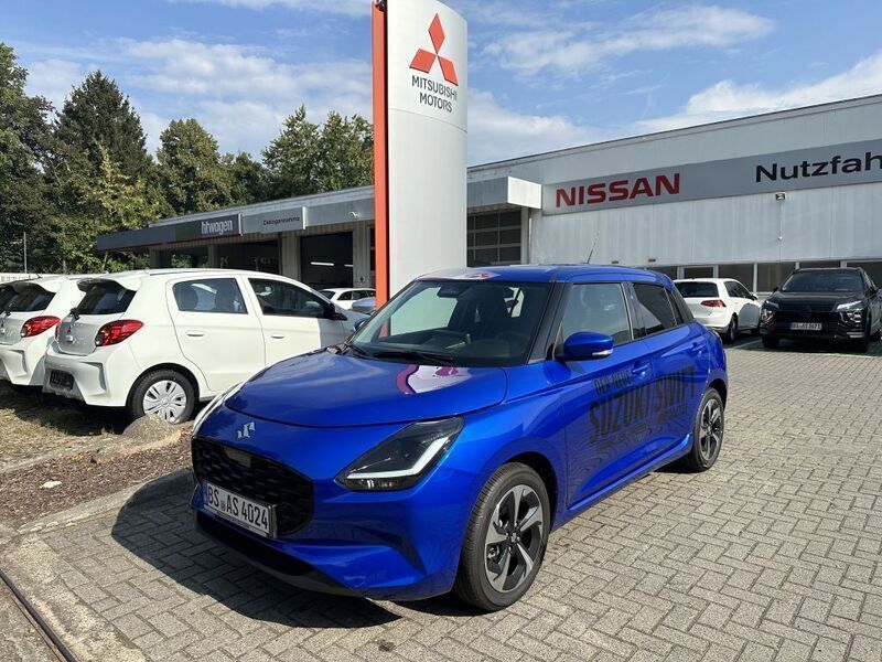 Blau Gebraucht 2024 Suzuki Swift Comfort+ Limousine | 18.880 € (Etwas zu teuer) - Bild 1/4
