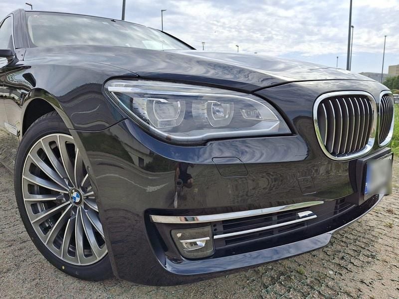 Schwarz Gebraucht 2014 BMW ActiveHybrid 7 Comfort Edition Limousine | 18.900 € - Bild 1/4