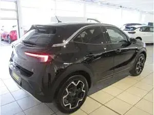 Gebraucht Opel Mokka-e Ultimate 100 kW (136 PS) 2024 Schwarz (lackierung schwarz perla nera/typ aussenverkl) SUV