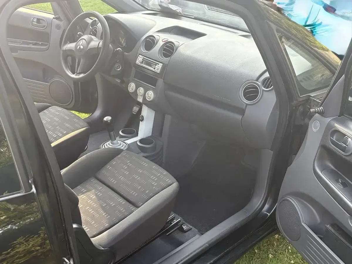 Gebraucht Mitsubishi Colt 75 PS (55 kW) 2006 Schwarz Kleinwagen