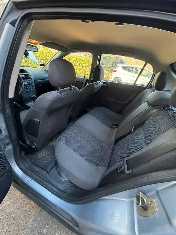Second-hand Opel Astra 84 CP (61 kW) 2001 Argintiu Berlinǎ