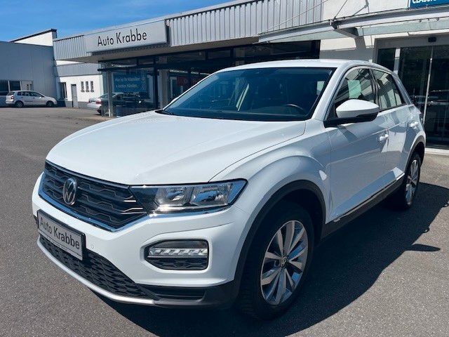 Pure white (metallic) Gebraucht 2021 VW T-Roc Style SUV | 18.880 € (Fairer Preis) - Bild 1/4