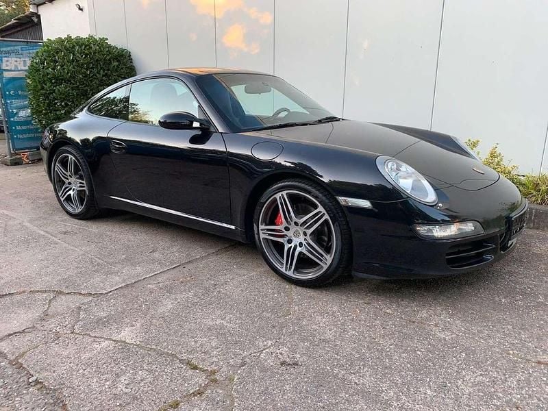 Basaltschwarzmetallic Gebraucht 2007 Porsche 997 Coupé | 42.997 € - Bild 1/4