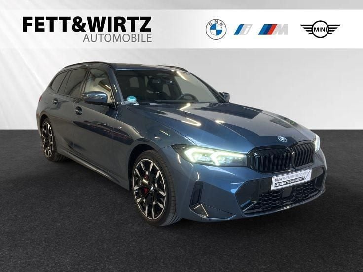 Arctic race blue metallic Gebraucht 2024 BMW 330e M Sport Kombi | 49.900 € (Teuer) - Bild 1/3