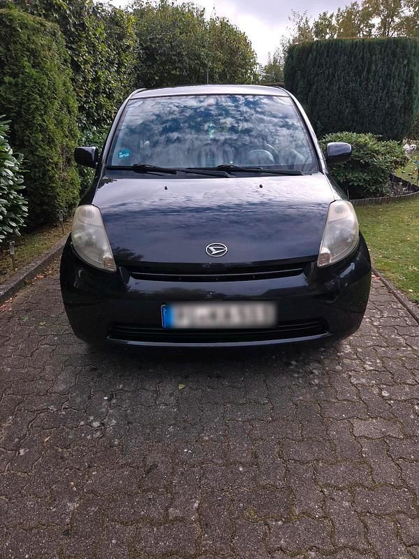 Schwarz Gebraucht 2005 Daihatsu Sirion Kleinwagen | 950 € - Bild 1/4
