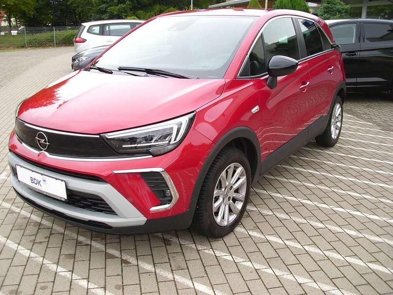 Chili rot/kardio rot Gebraucht 2022 Opel Crossland X Elegance SUV | 17.950 € (Fairer Preis) - Bild 1/4