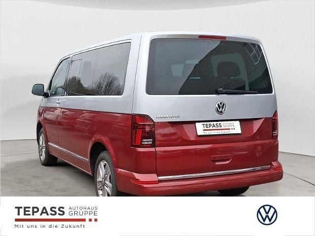 Gebraucht VW Multivan Comfortline 150 PS (110 kW) 2020 Reflexsilber / fortanarot meta Van