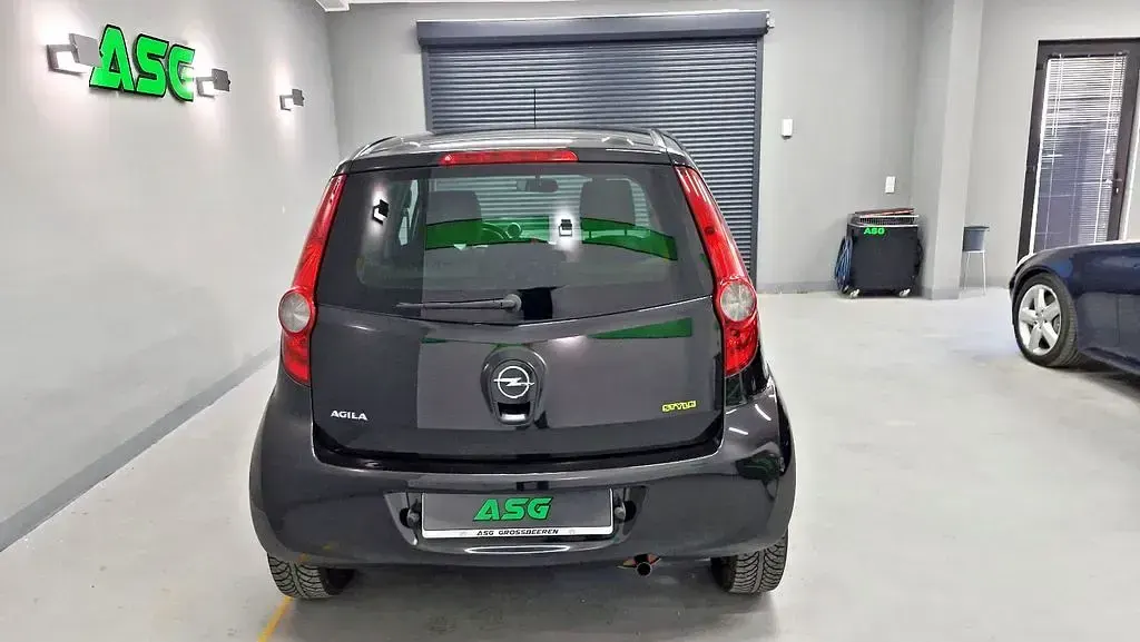 Używany Opel Agila Edition 94 KM (69 kW) 2011 Czarny Hatchback