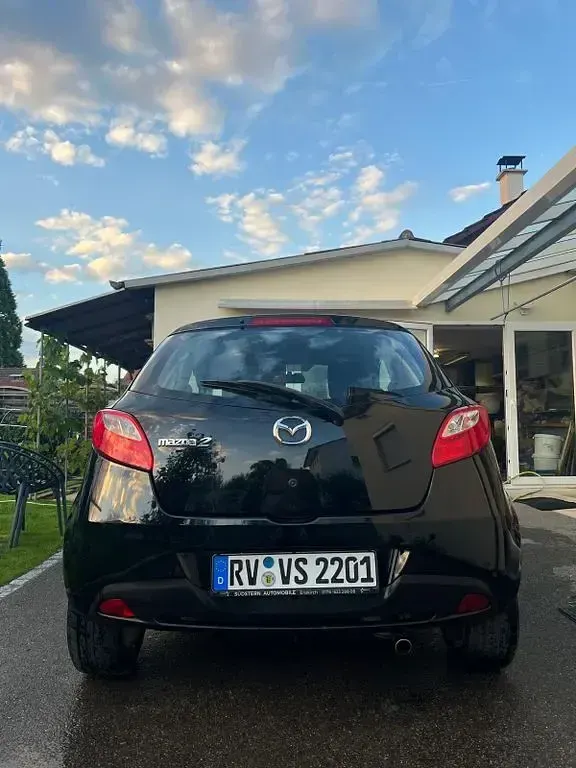 Gebraucht Mazda 2 75 PS (55 kW) 2010 Schwarz Kleinwagen