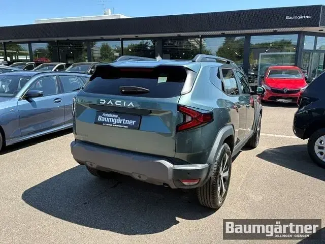 Gebraucht Dacia Duster Journey 131 PS (96 kW) 2025 Zedergrün metallic SUV