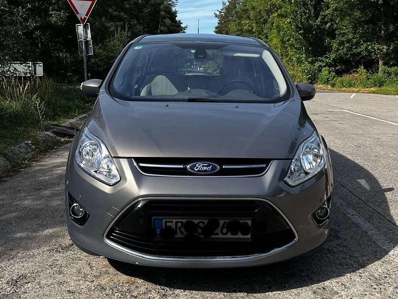 Braun Gebraucht 2012 Ford Grand C-Max Titanium Van / Kleinbus | 5.555 € (Etwas zu teuer) - Bild 1/4