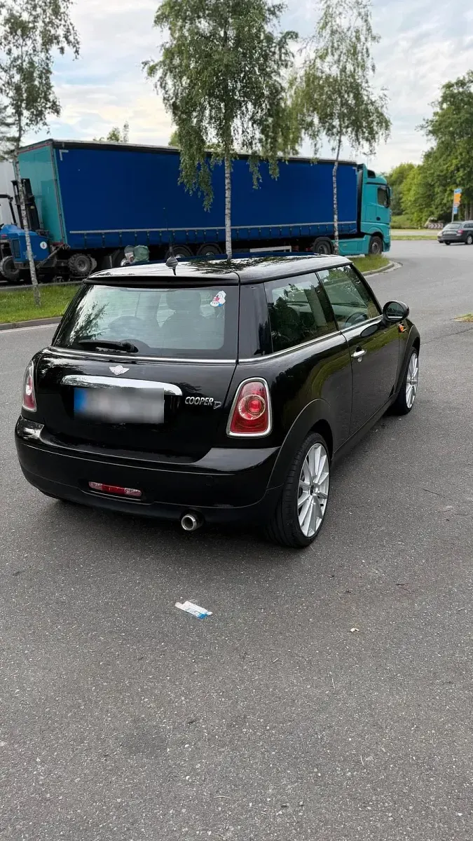 Gebraucht Mini Cooper D 112 PS (82 kW) 2011 Schwarz Kleinwagen