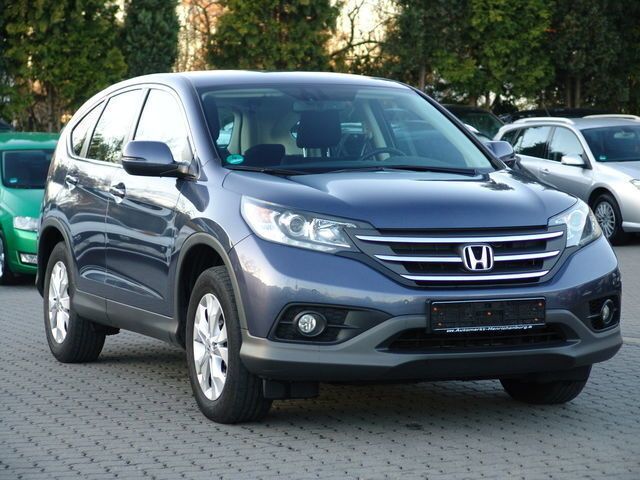 Blau metallic Gebraucht 2014 Honda CR-V Elegance SUV | 21.900 € - Bild 1/4