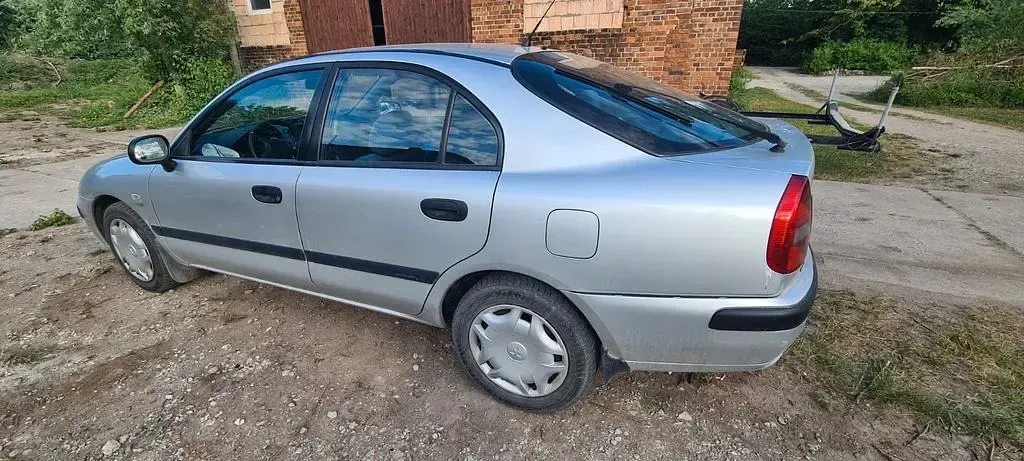 Gebraucht Mitsubishi Carisma 125 PS (91 kW) 2001 Silber Limousine