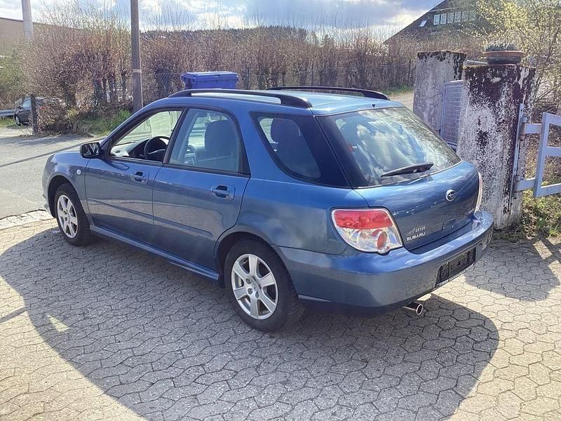 Gebraucht Subaru Impreza 105 PS (77 kW) 2006 Blau Kombi