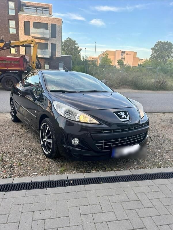 Schwarz Gebraucht 2010 Peugeot 207 CC Roland Garros Cabrio | 4.999 € (Teuer) - Bild 1/4